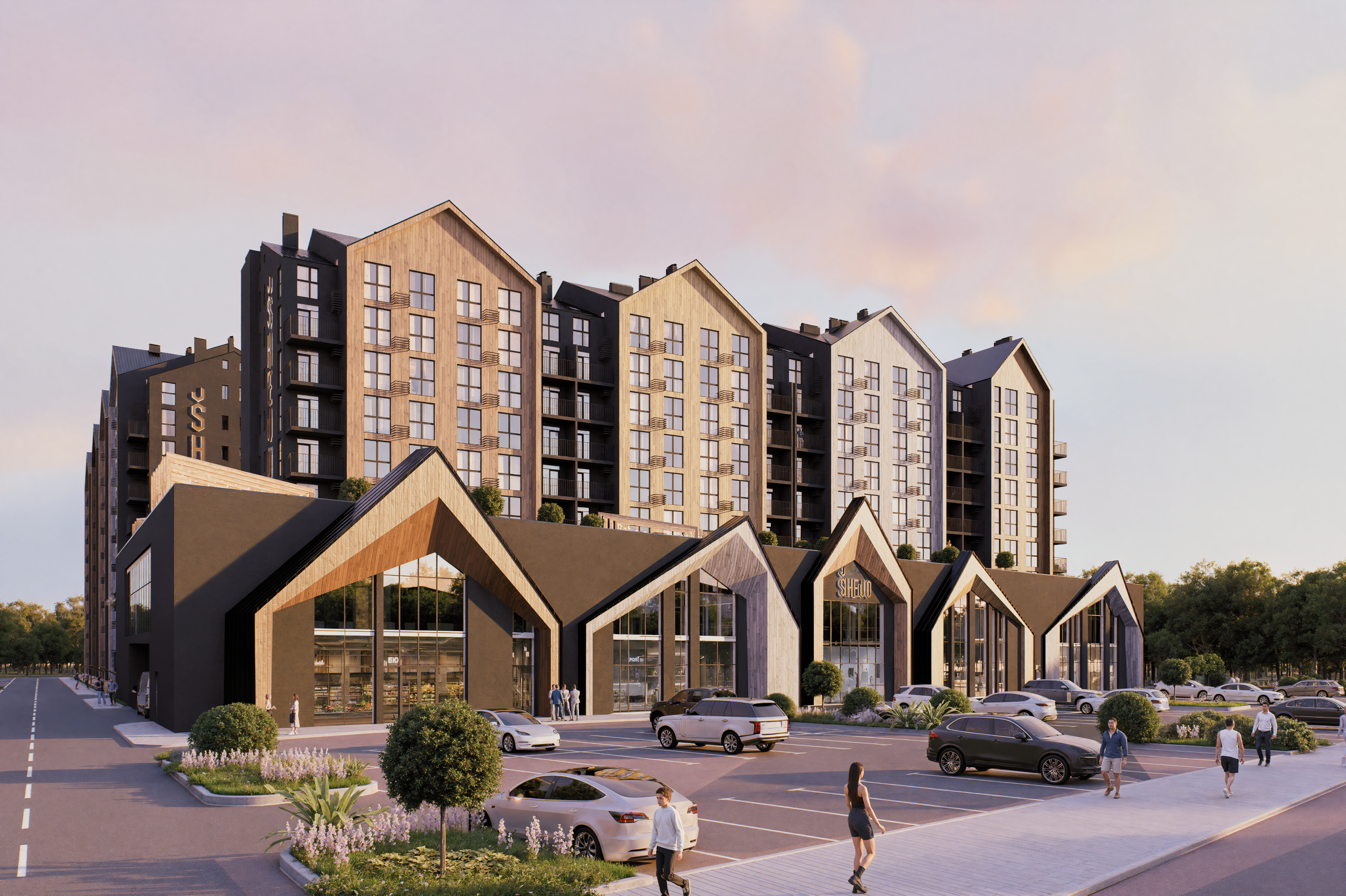 Photo of rows of books in a library with marble busts.